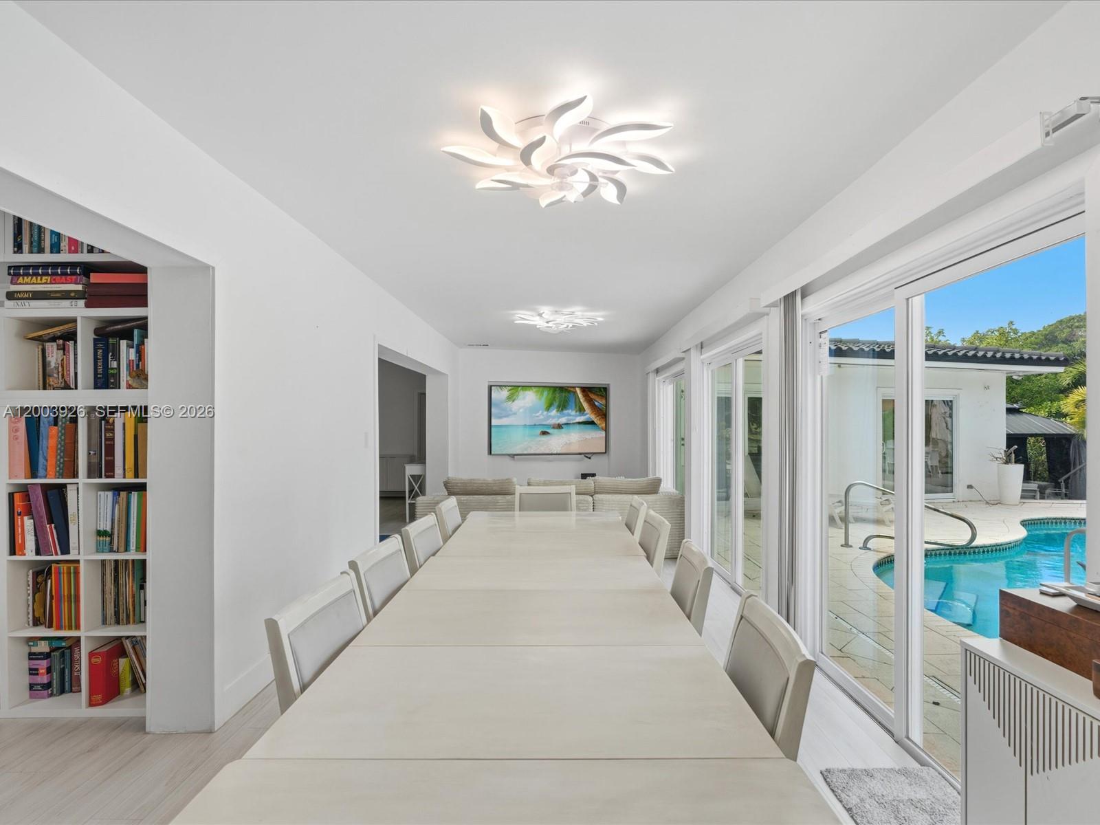 5000 Riviera Drive Coral Gables, FL 33146 - Photo 29 of 80 a view of a livingroom with furniture and staircase