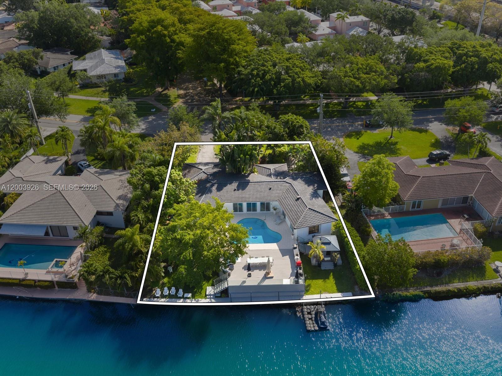 5000 Riviera Drive Coral Gables, FL 33146 - Photo 3 of 80 an aerial view of house with a yard