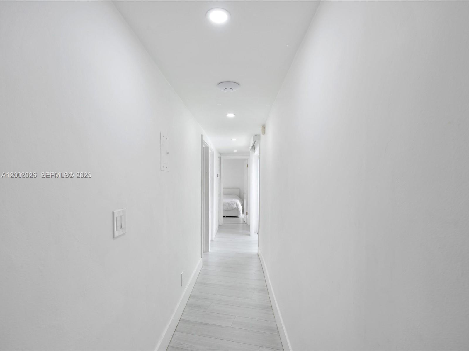 5000 Riviera Drive Coral Gables, FL 33146 - Photo 39 of 80 a view of a hallway with a white walls