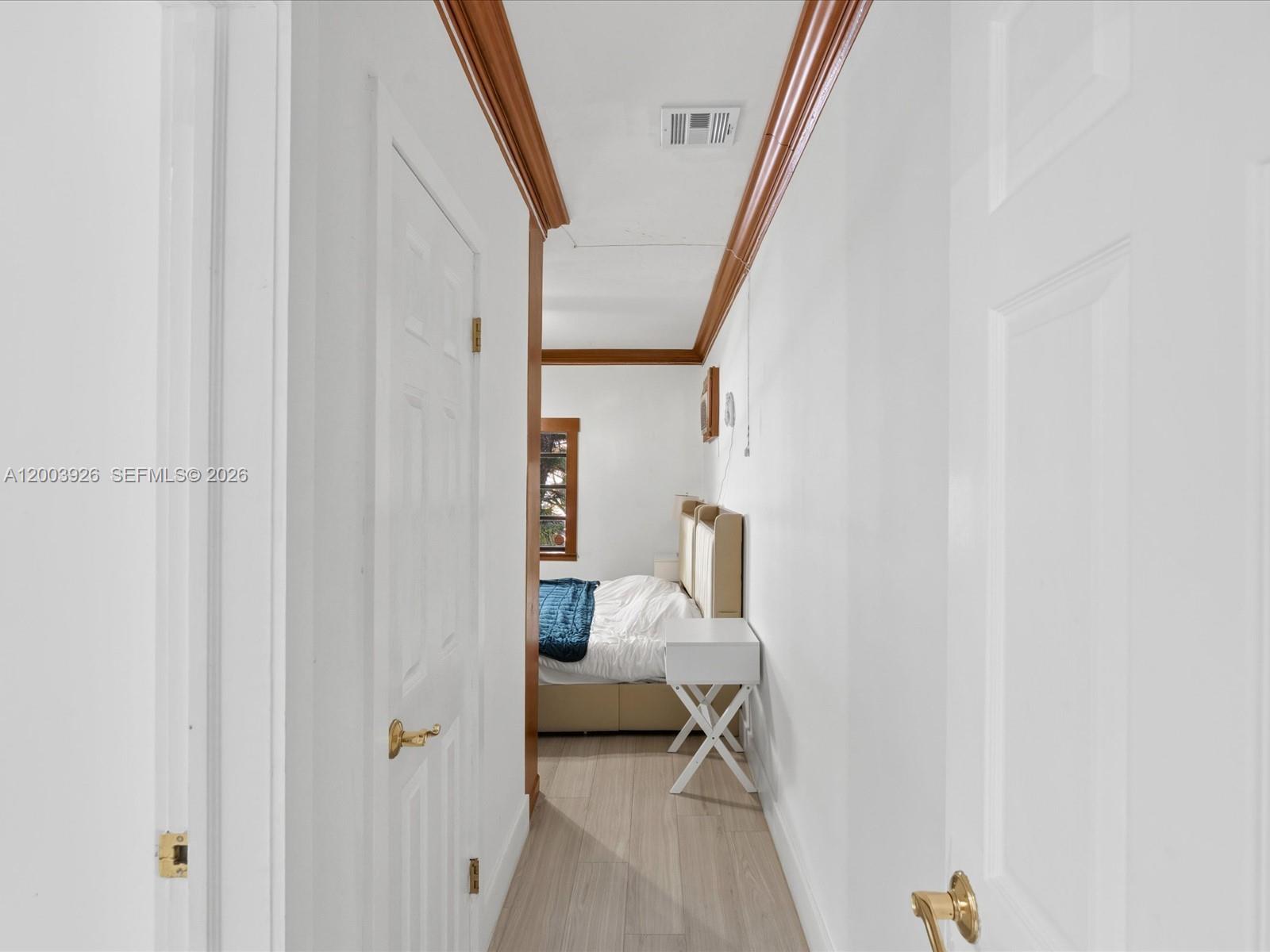 5000 Riviera Drive Coral Gables, FL 33146 - Photo 40 of 80 a bedroom with a bed and a couch