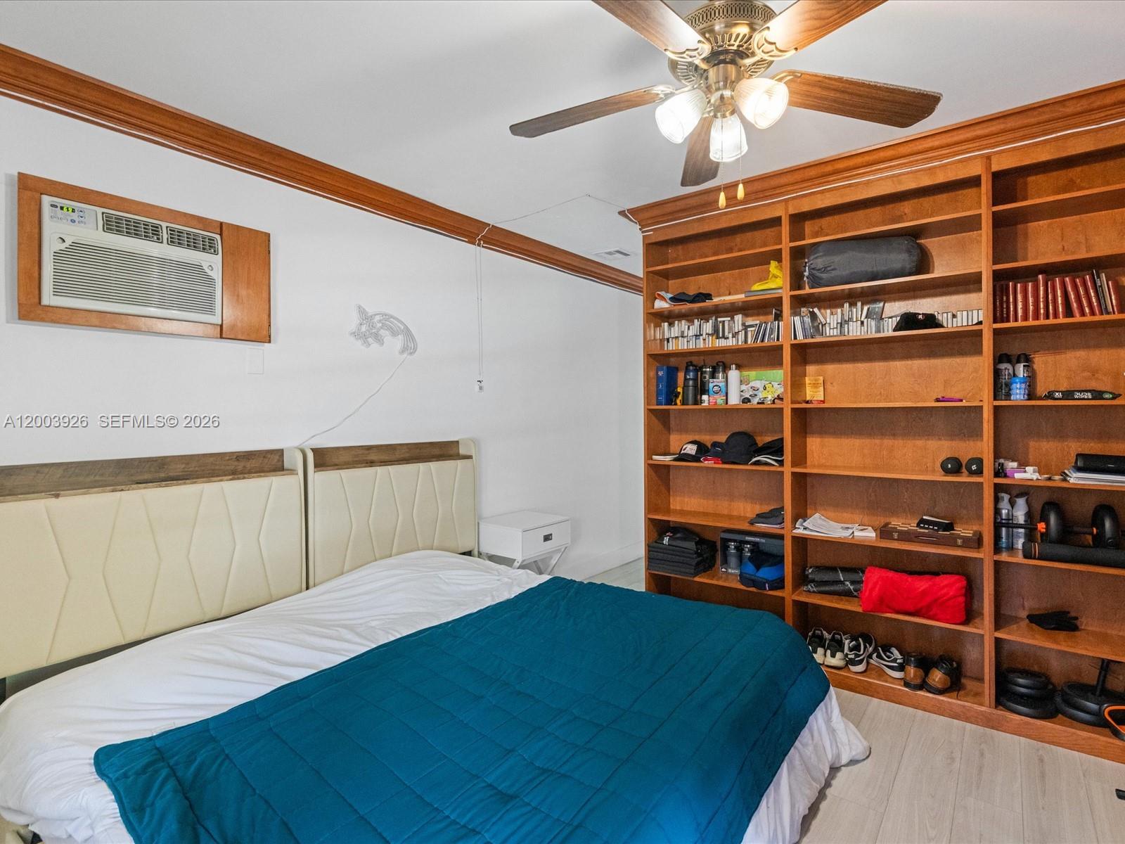 5000 Riviera Drive Coral Gables, FL 33146 - Photo 41 of 80 a bedroom with a bed and closet