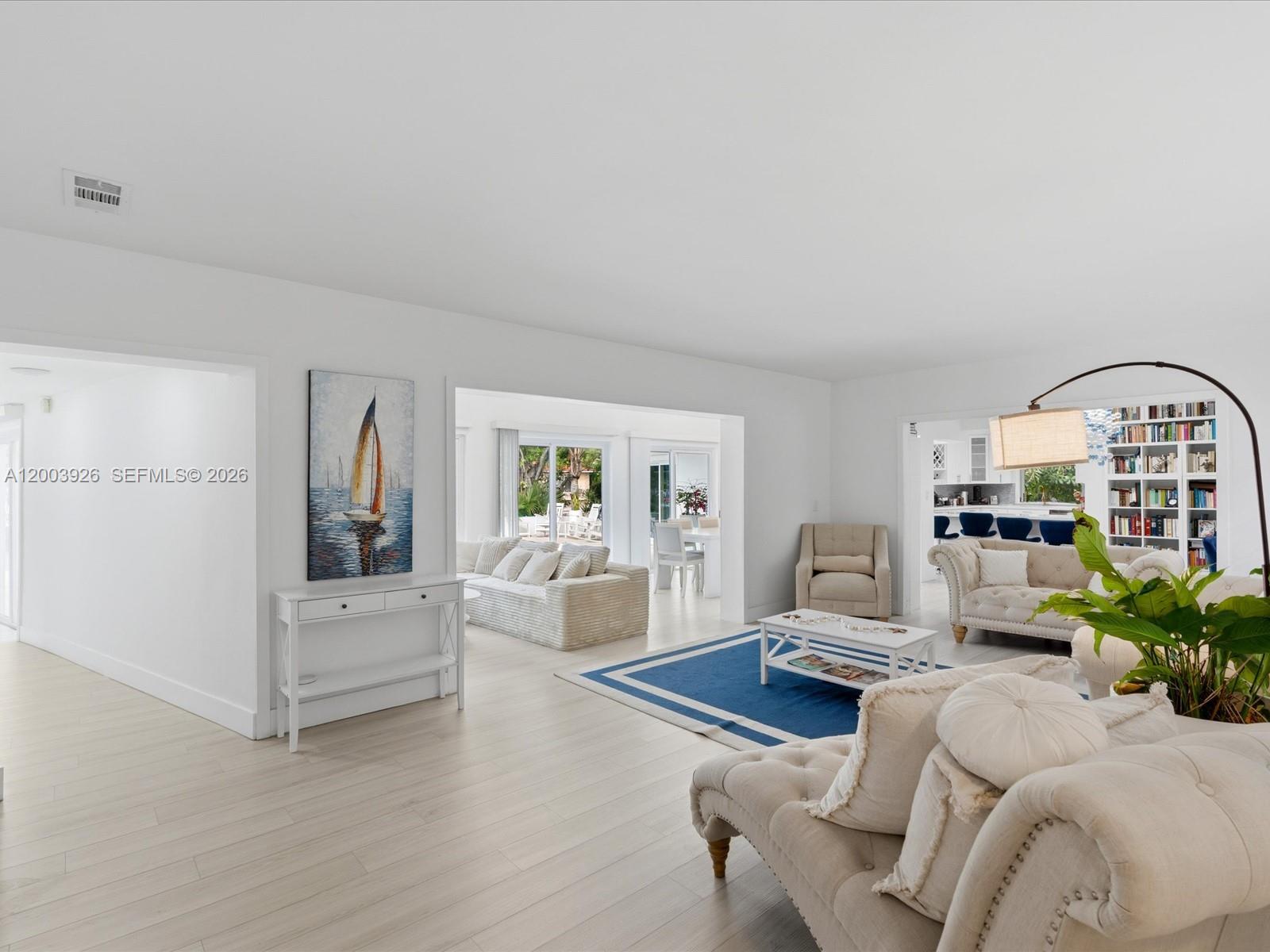 5000 Riviera Drive Coral Gables, FL 33146 - Photo 51 of 80 a living room with furniture and wooden floor