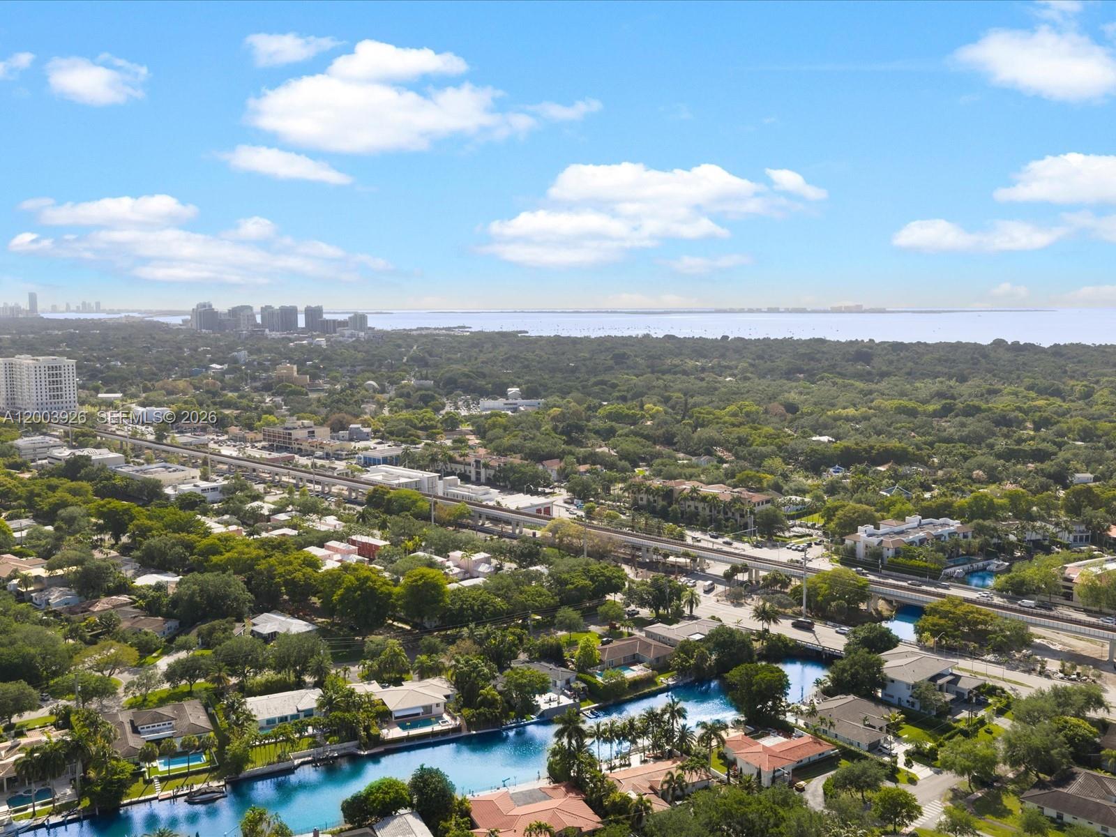 5000 Riviera Drive Coral Gables, FL 33146 - Photo 57 of 80 an aerial view of residential building with green space