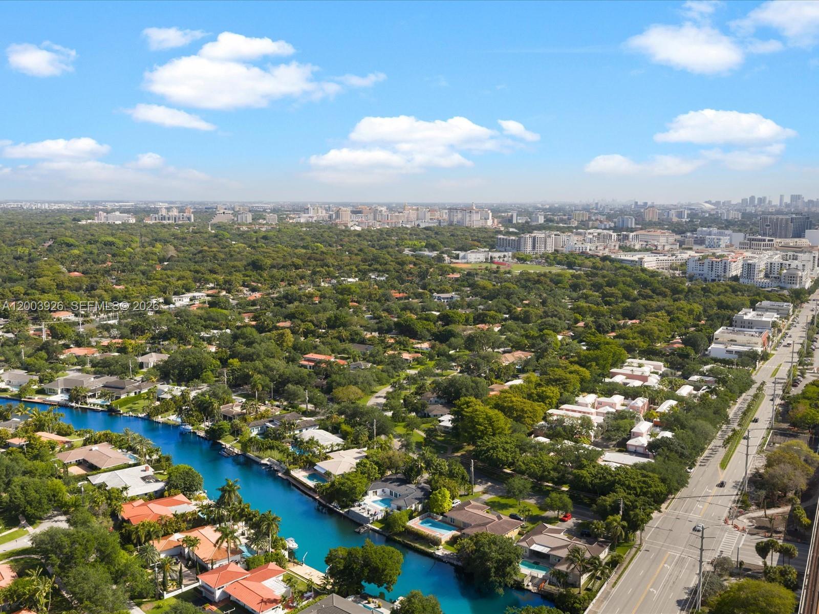 5000 Riviera Drive Coral Gables, FL 33146 - Photo 58 of 80 an aerial view of residential houses with outdoor space