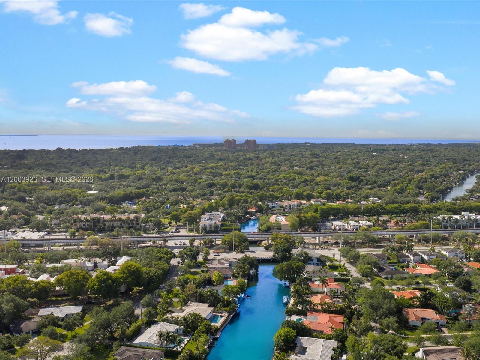 5000 Riviera Drive Coral Gables, FL 33146 - Photo 60 of 80 an aerial view of residential building with green space