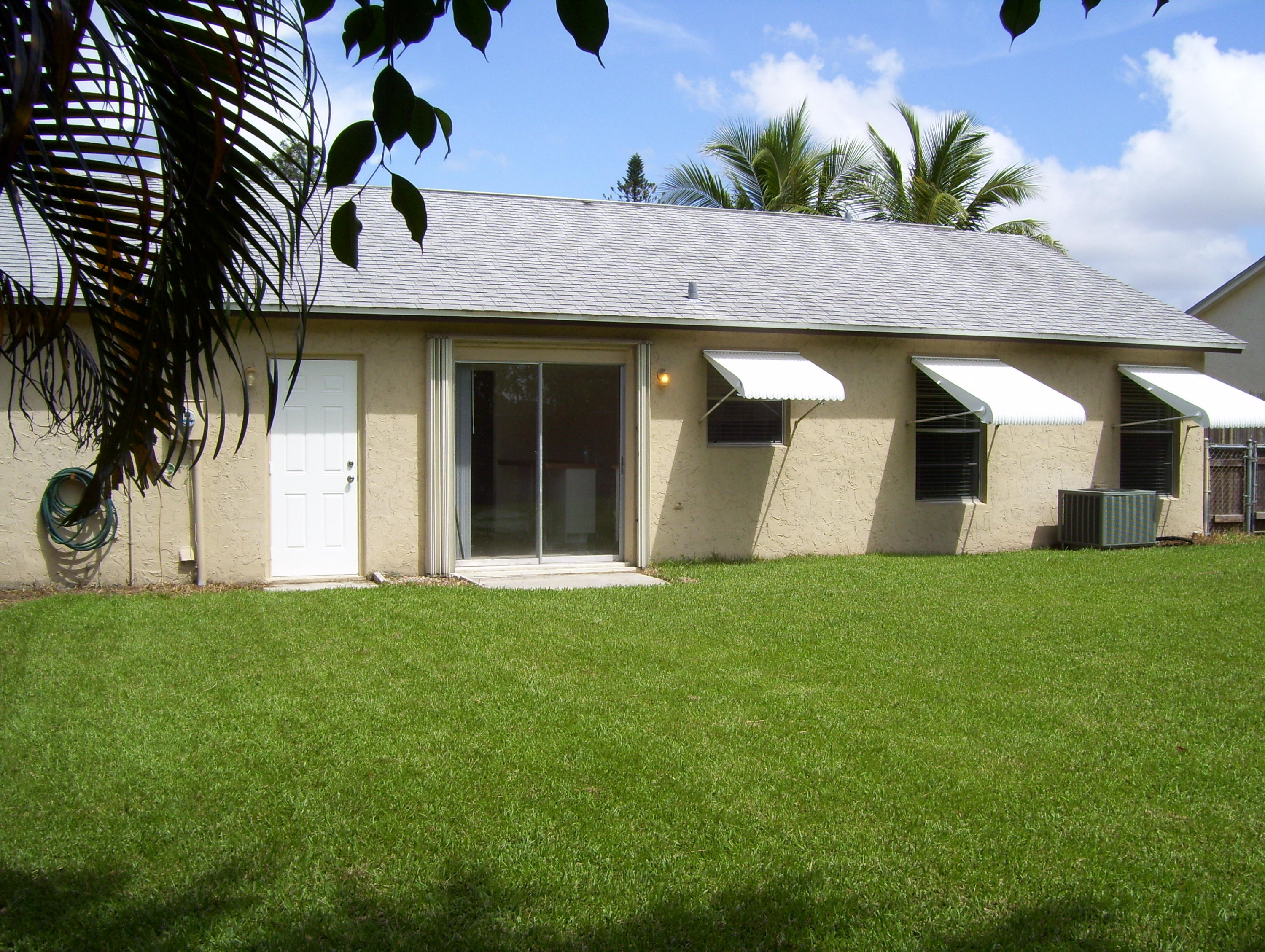152 Banyan Circle Jupiter, FL 33458 - Photo 20 of 21 Exterior Backyard