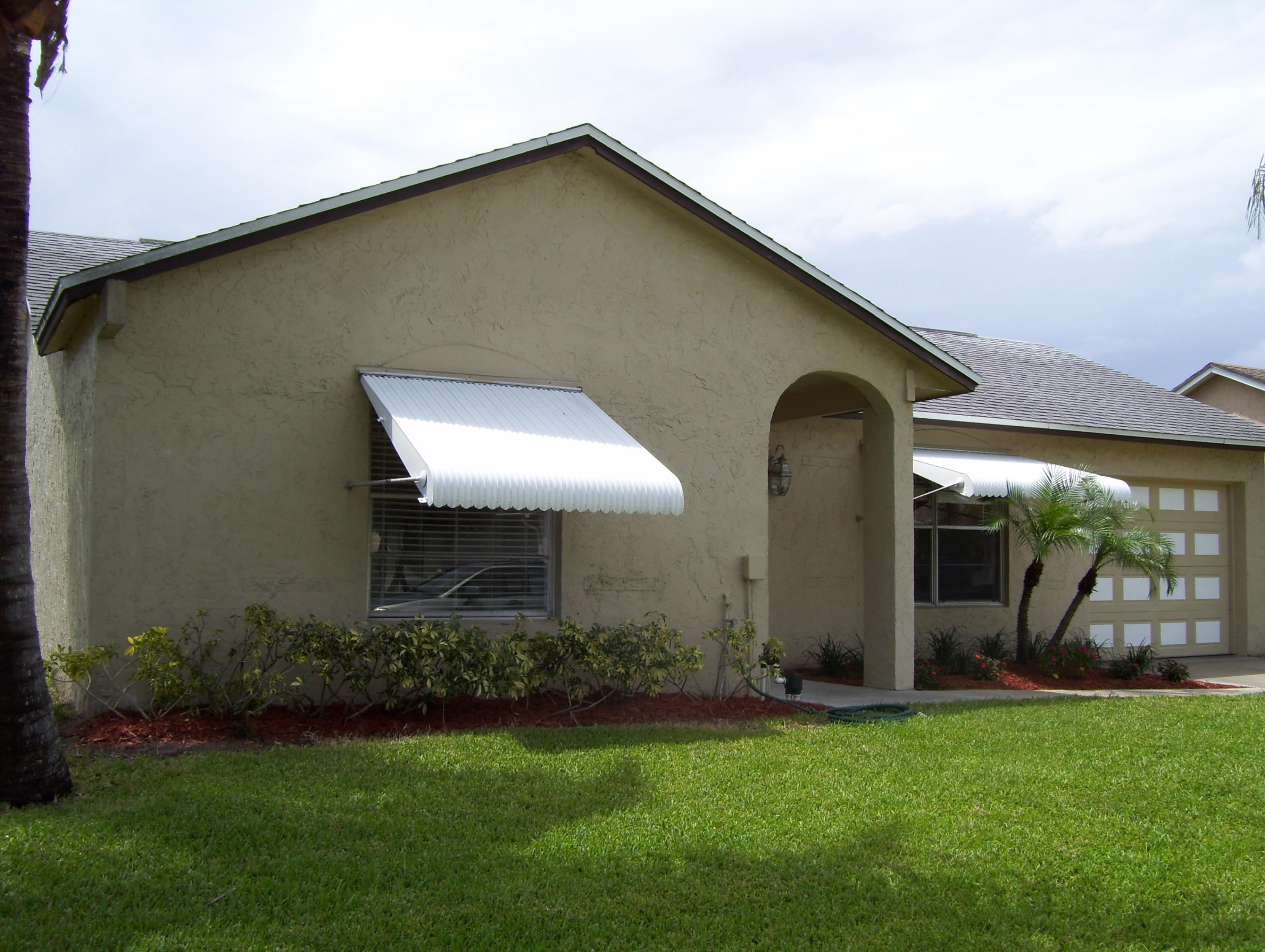 152 Banyan Circle Jupiter, FL 33458 - Photo 2 of 21 Exterior Front