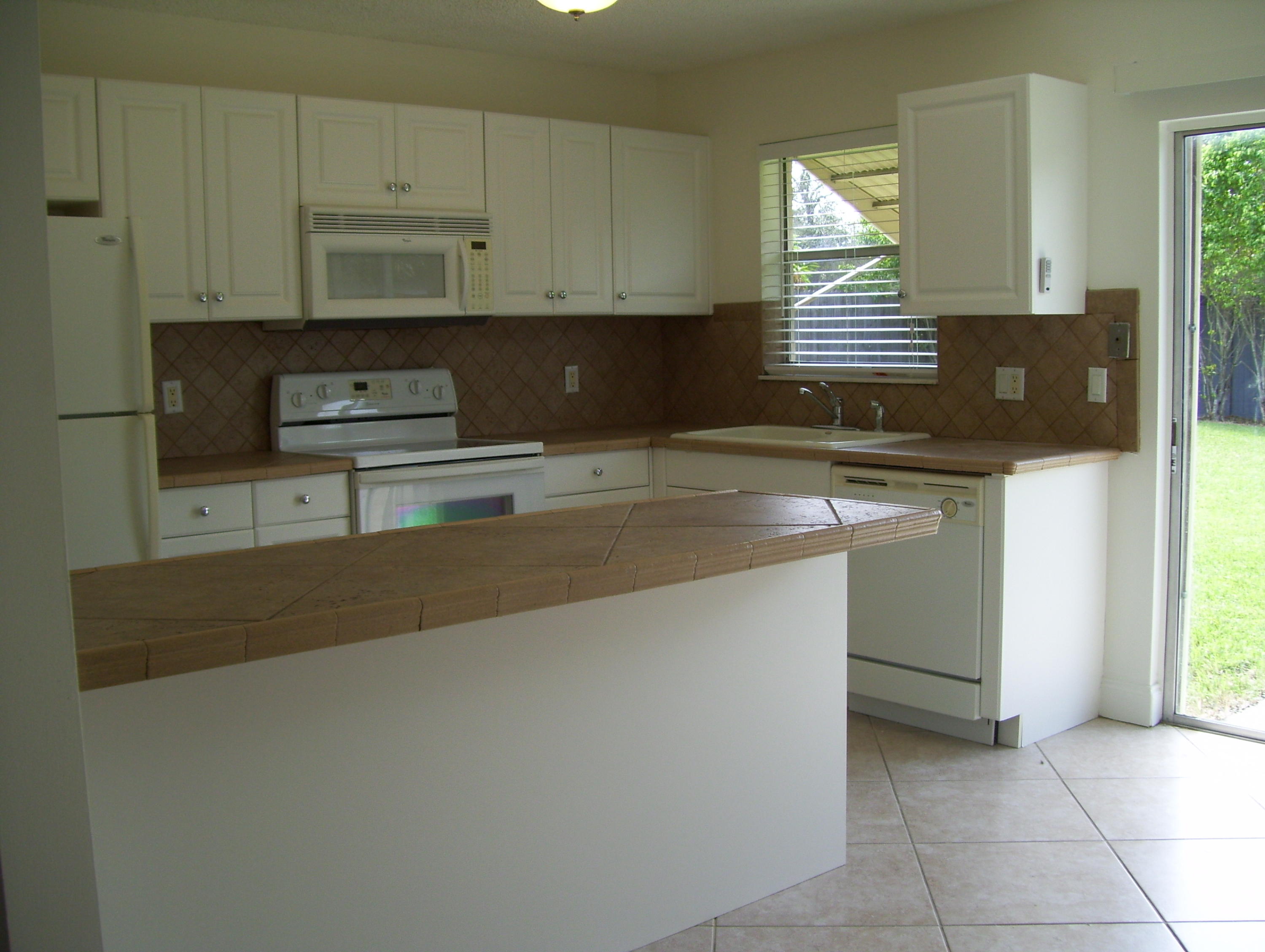 152 Banyan Circle Jupiter, FL 33458 - Photo 4 of 21 Large Open Kitchen w/Snack Bar