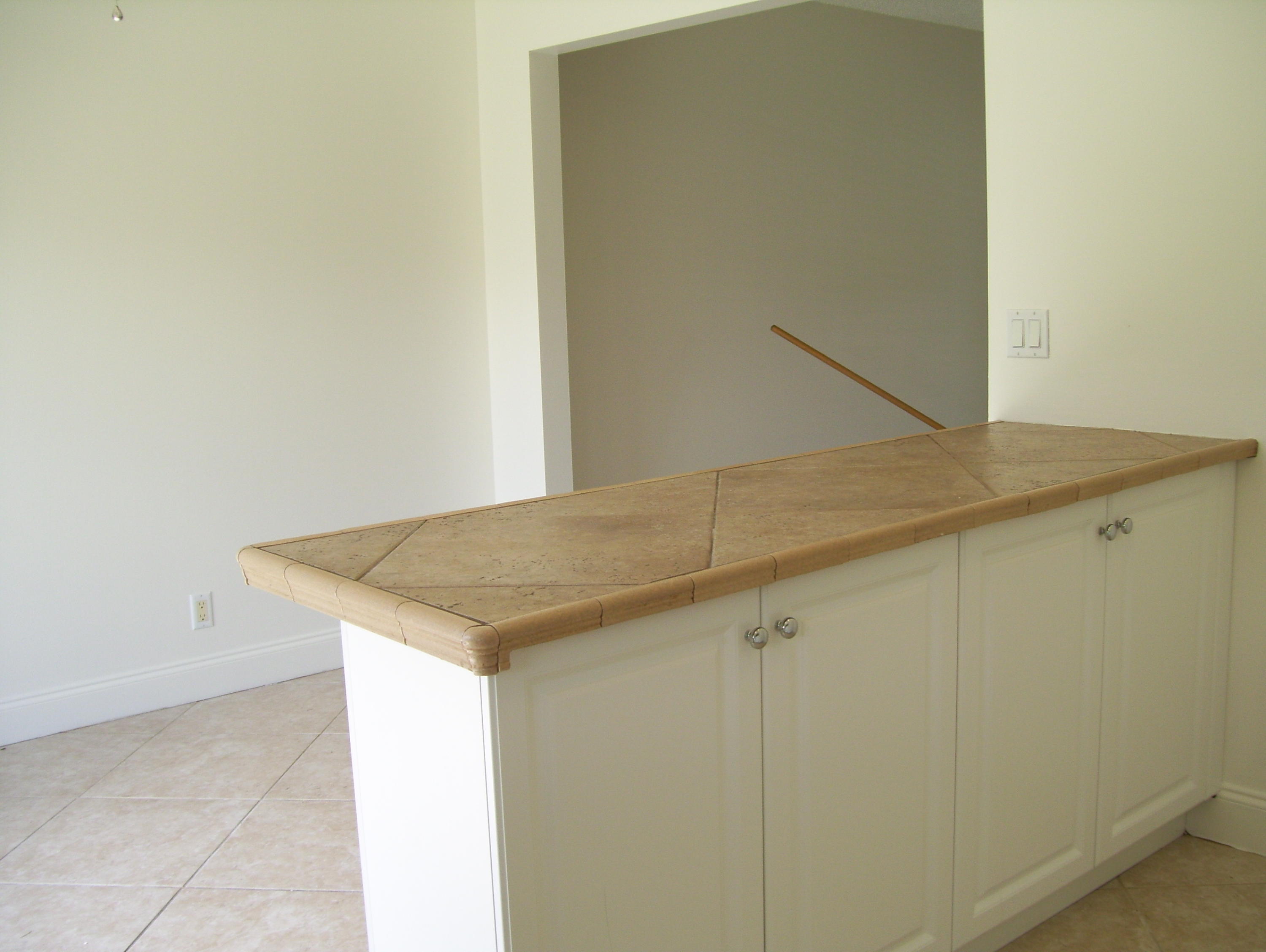 152 Banyan Circle Jupiter, FL 33458 - Photo 5 of 21 Kitchen Snack/Breakfast Bar w/Storage