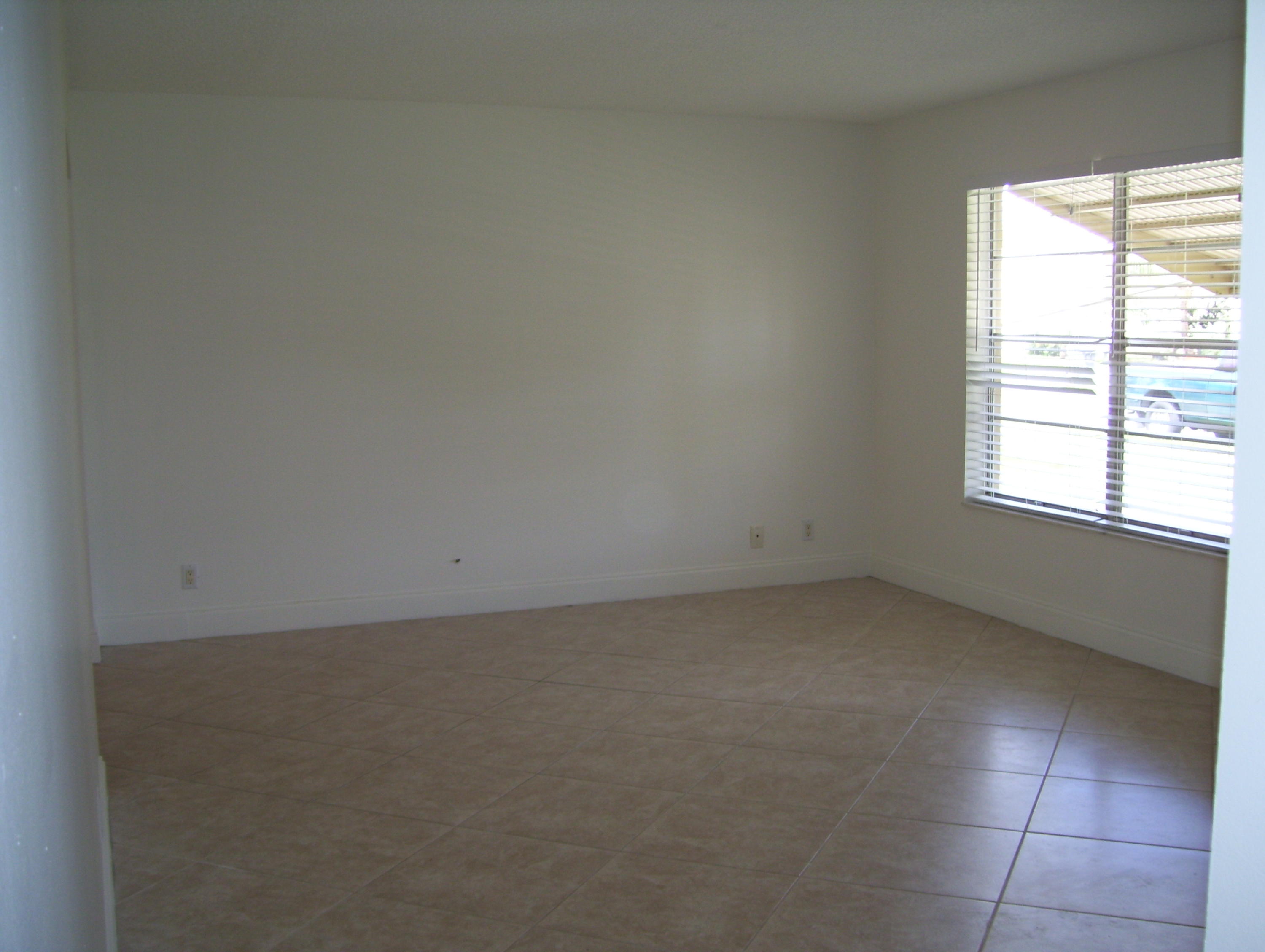 152 Banyan Circle Jupiter, FL 33458 - Photo 7 of 21 Tiled Living Room
