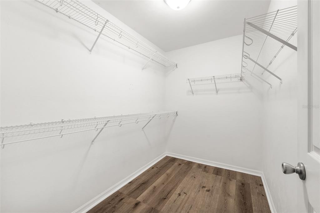 4928 Southwest 63rd Lane Gainesville, FL 32608 - Photo 16 of 32 a view of a room with racks on the wall
