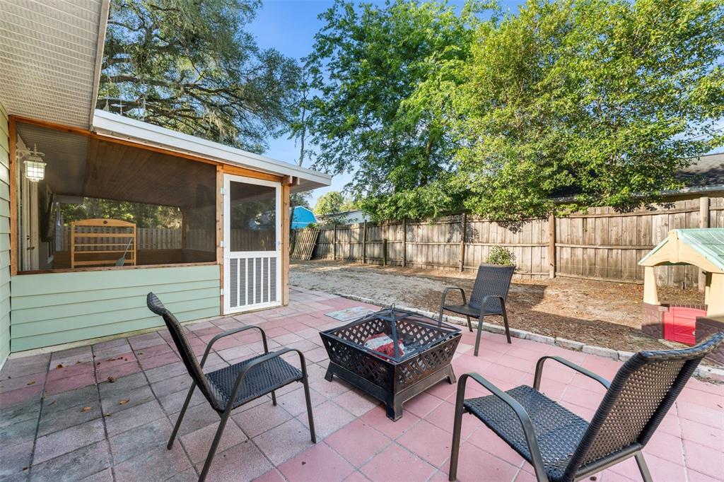 4928 Southwest 63rd Lane Gainesville, FL 32608 - Photo 29 of 32 a view of a patio with couple of chairs
