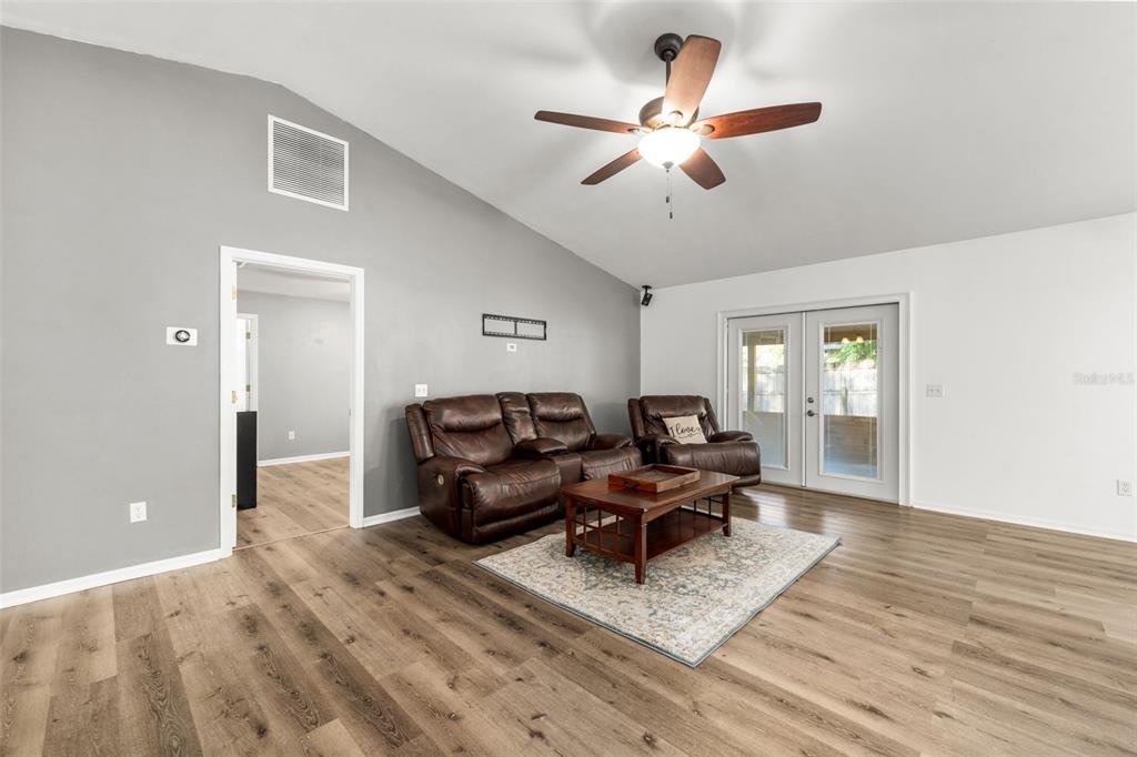 4928 Southwest 63rd Lane Gainesville, FL 32608 - Photo 7 of 32 a living room with furniture
