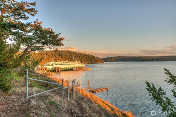 a view of a lake from a balcony