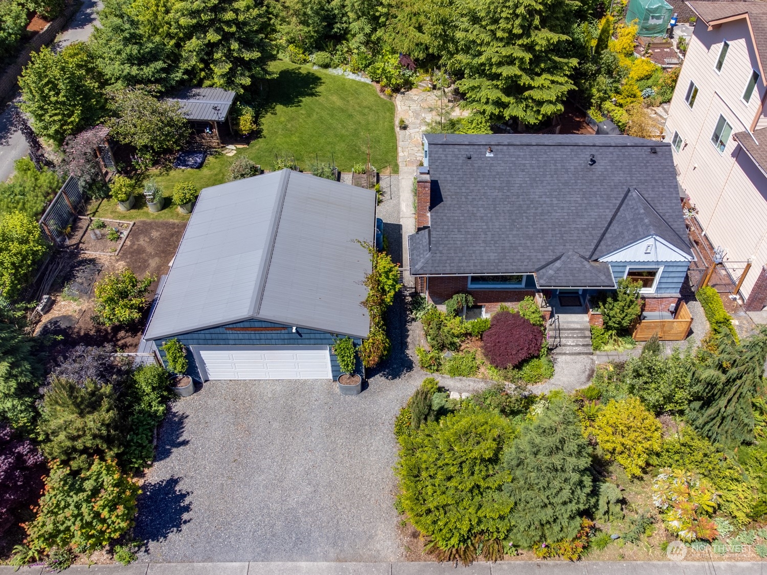 3912 Friday Avenue Everett, WA 98201 - Photo 1 of 35 an aerial view of a house with a yard and garden
