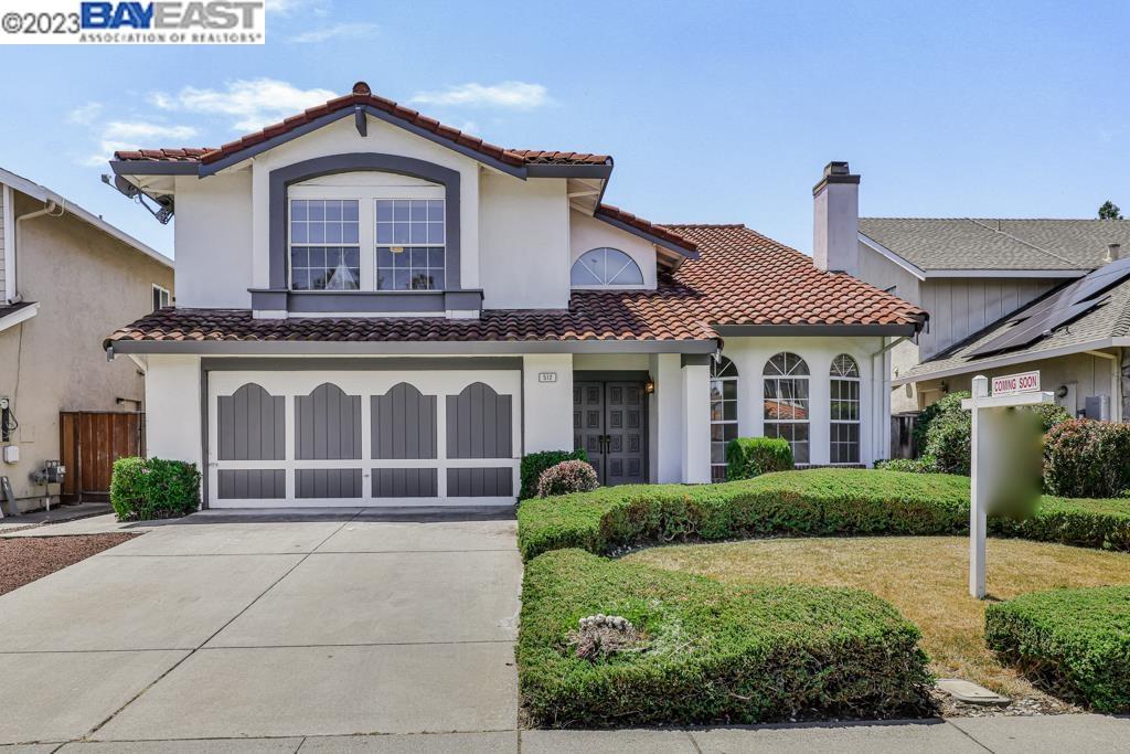 512 Fallen Leaf Circle San Ramon, CA 94583 - Photo 1 of 1 a front view of a house with a garden