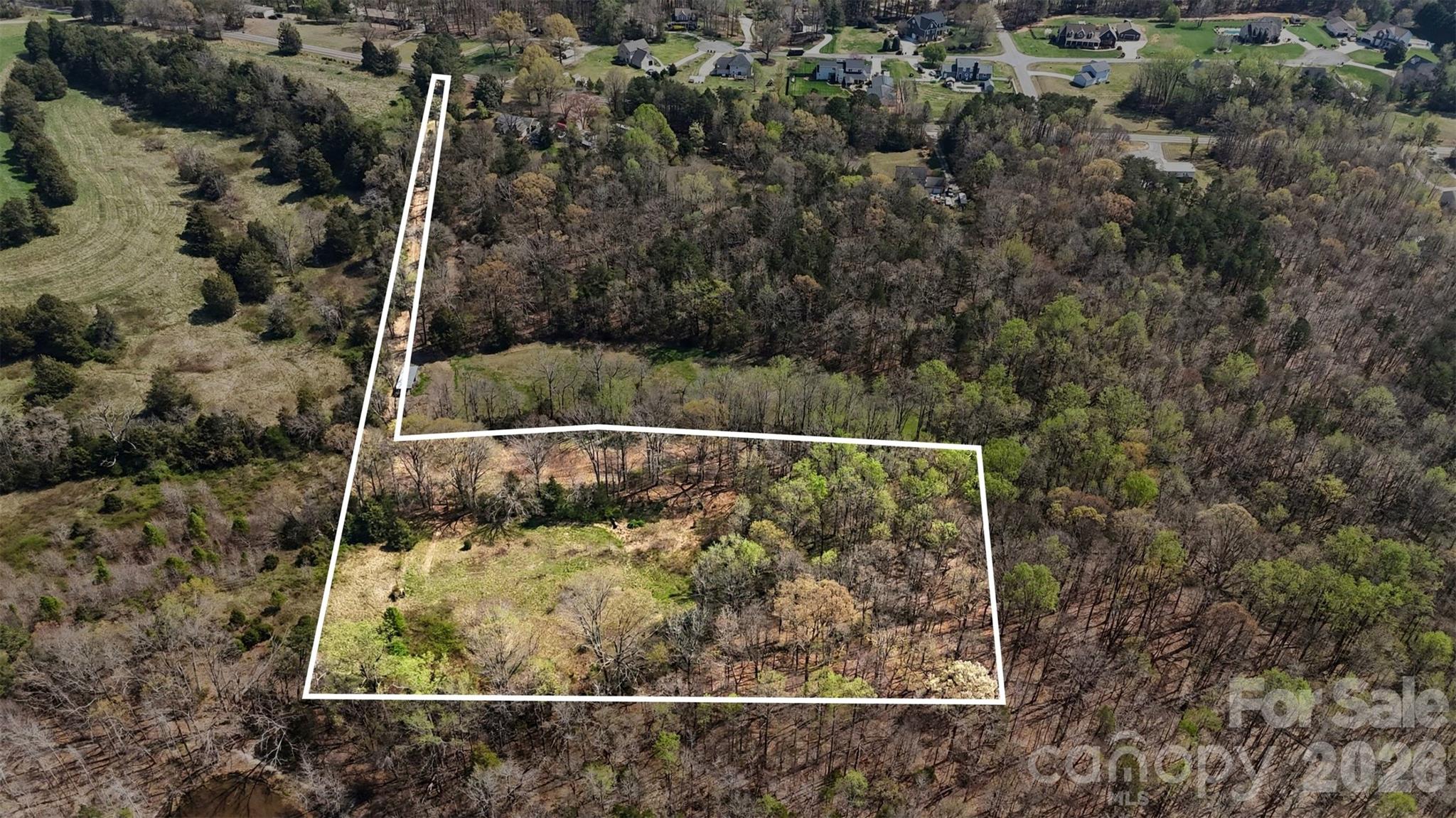 252 Teeter Road Mooresville, NC 28115 - Photo 2 of 22 a view of a small yard