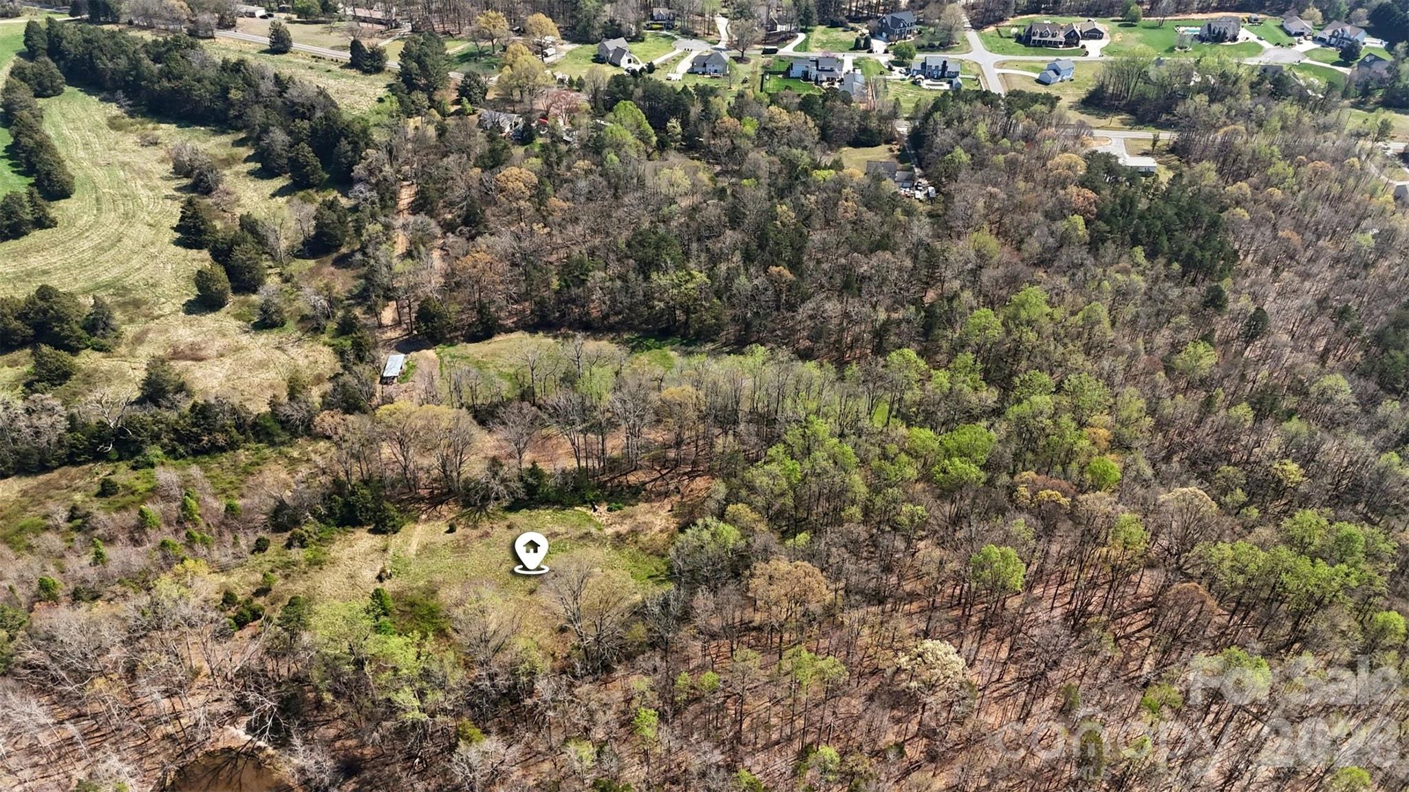 252 Teeter Road Mooresville, NC 28115 - Photo 5 of 22 a view of a house with a tree
