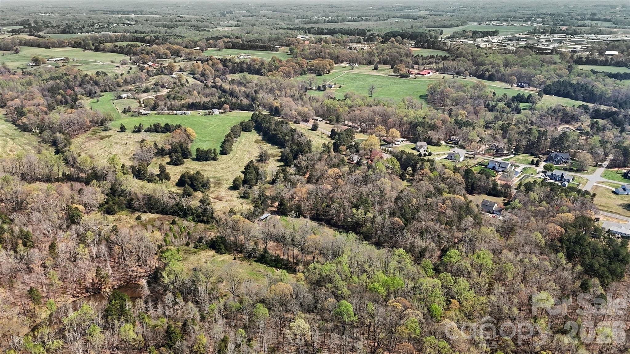 252 Teeter Road Mooresville, NC 28115 - Photo 9 of 22 an aerial view of residential houses with outdoor space and trees