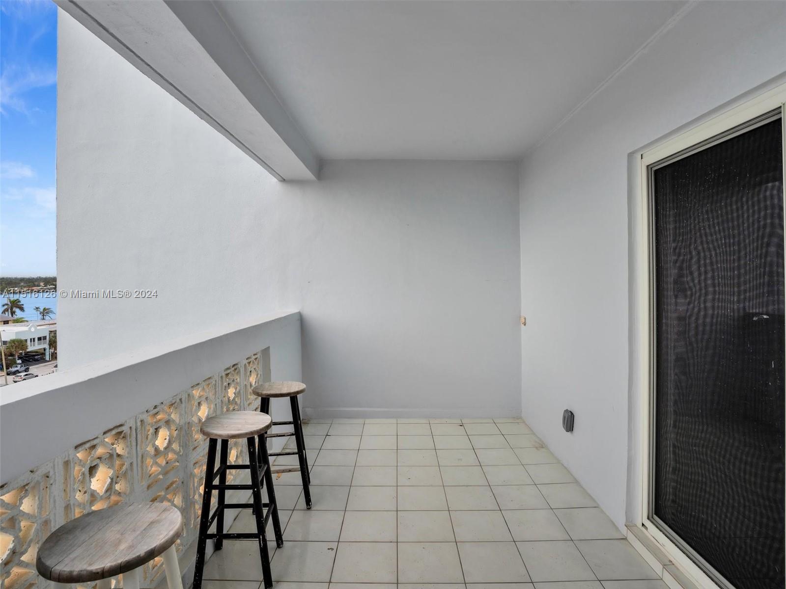 320 South Surf Road, Unit 705 Hollywood, FL 33019 - Photo 5 of 29 a view of an empty room and bathroom