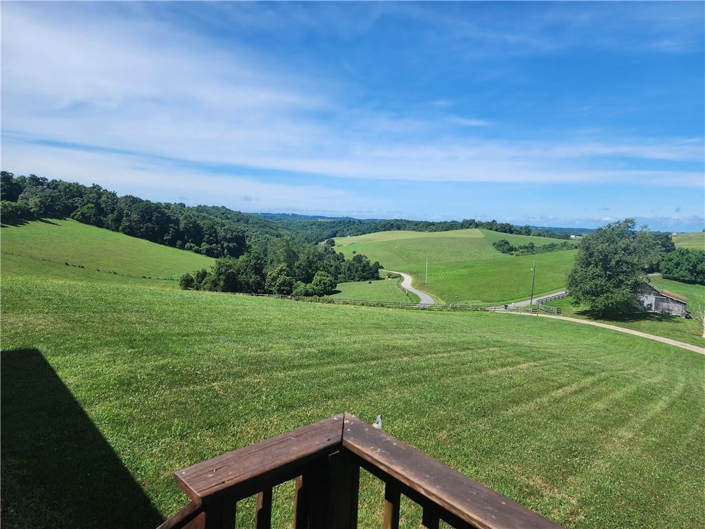321 Chambers Ridge Road West Alexander, PA 15376 - Photo 11 of 42 a view of a golf course with a lake