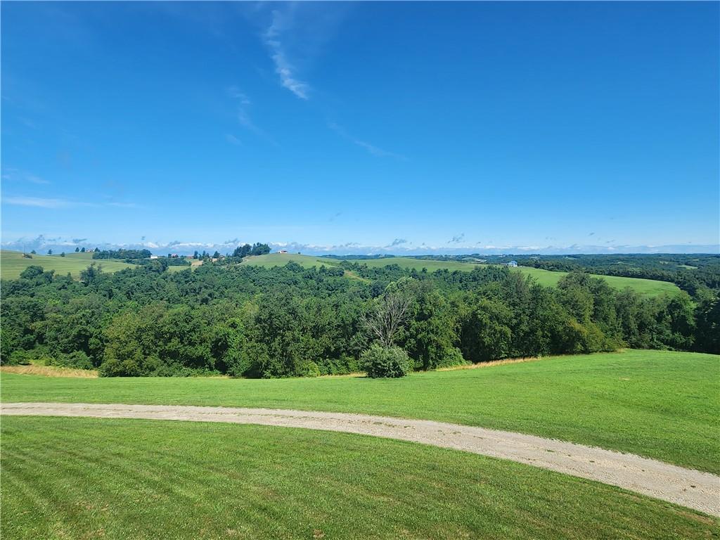 321 Chambers Ridge Road West Alexander, PA 15376 - Photo 13 of 42 a view of a golf course with a lake