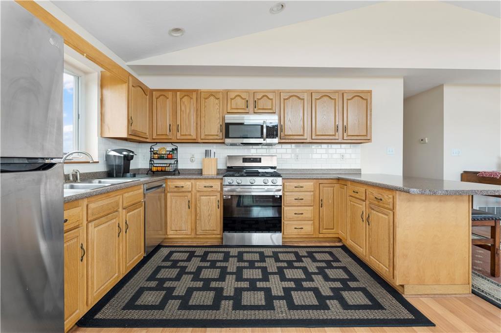 321 Chambers Ridge Road West Alexander, PA 15376 - Photo 15 of 42 a kitchen with stainless steel appliances a stove a sink and a microwave