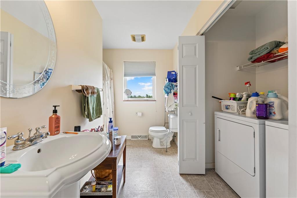321 Chambers Ridge Road West Alexander, PA 15376 - Photo 21 of 42 a bathroom with a sink mirror vanity and toilet