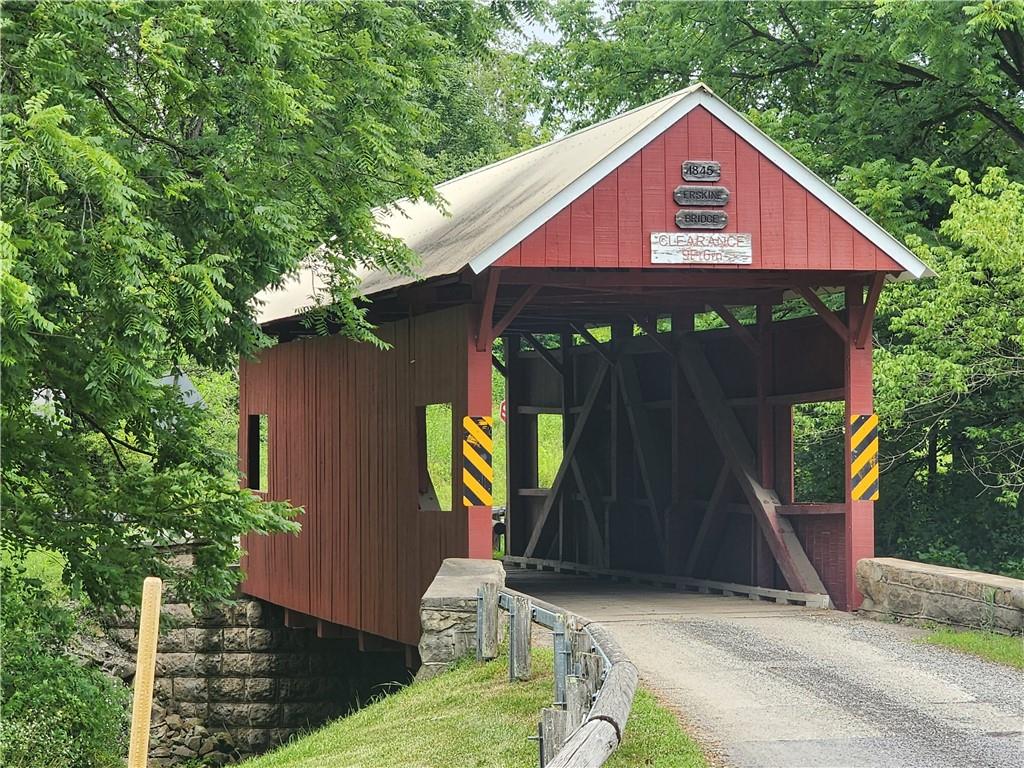 321 Chambers Ridge Road West Alexander, PA 15376 - Photo 29 of 42 a front view of house with yard and trees in the background