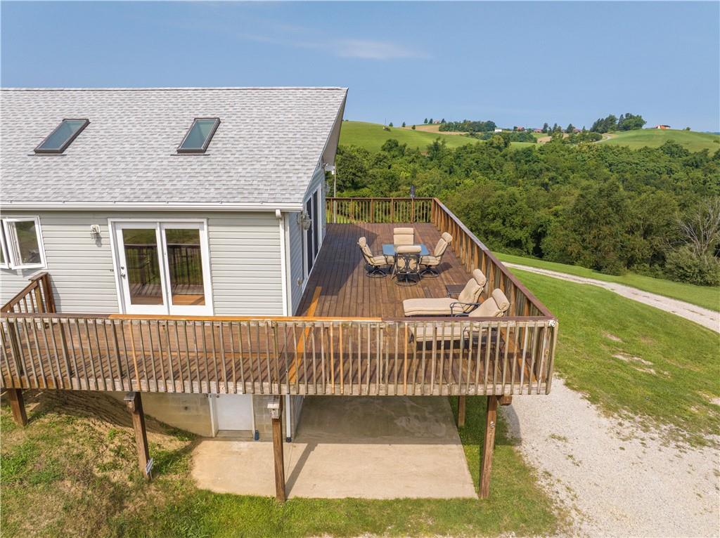 321 Chambers Ridge Road West Alexander, PA 15376 - Photo 37 of 42 a view of a roof deck with wooden fence and floor