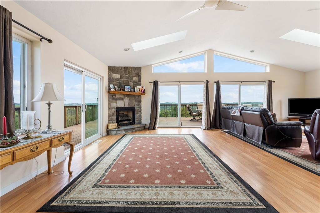 321 Chambers Ridge Road West Alexander, PA 15376 - Photo 8 of 42 a living room with fireplace furniture and a large window