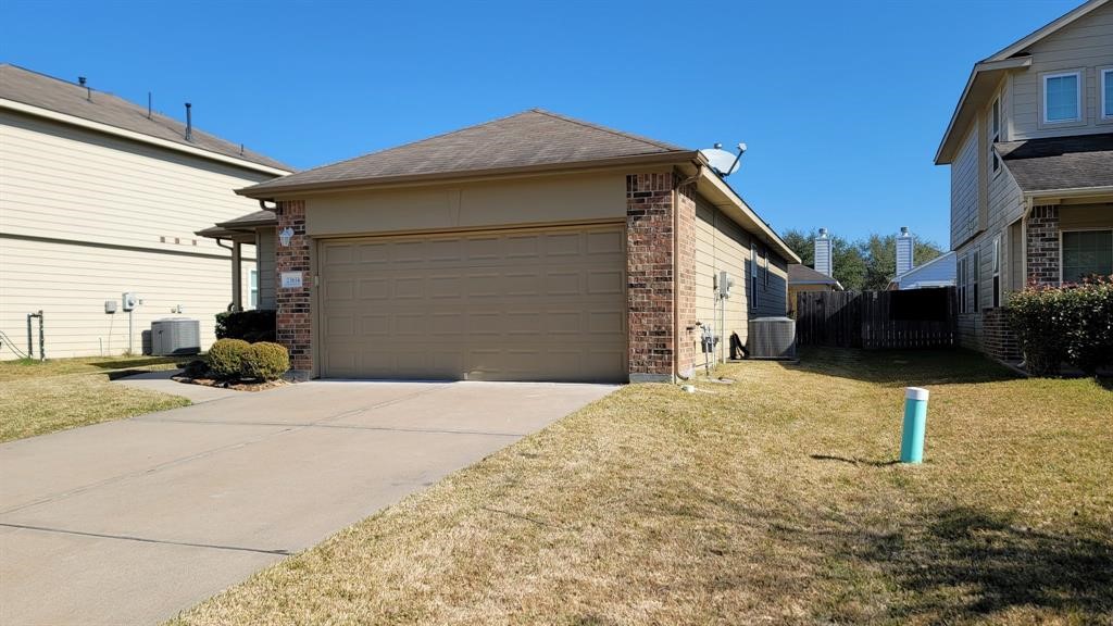 23614 Maple View Drive Spring, TX 77373 - Photo 22 of 23 a front view of a house with a yard