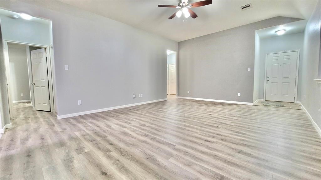 23614 Maple View Drive Spring, TX 77373 - Photo 8 of 23 a view of an empty room with wooden floor