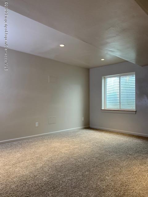 777 East 18th Street Rifle, CO 81650 - Photo 15 of 25 an empty room with windows