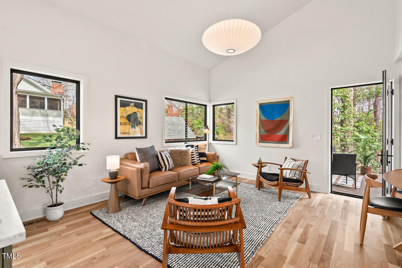 1407 Carroll Street Durham, NC 27707 - Photo 15 of 48 a living room with furniture and a large window