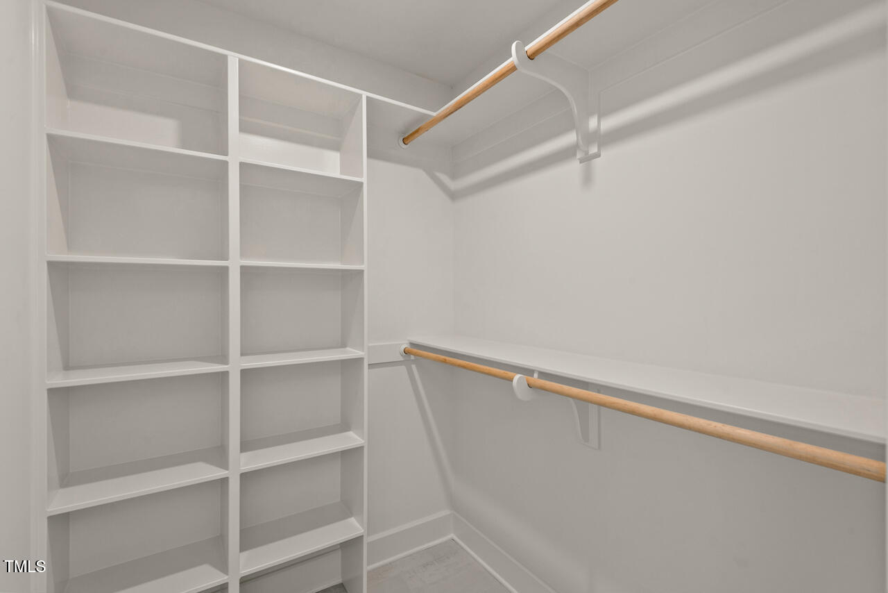 1407 Carroll Street Durham, NC 27707 - Photo 25 of 48 a view of an empty walk in closet