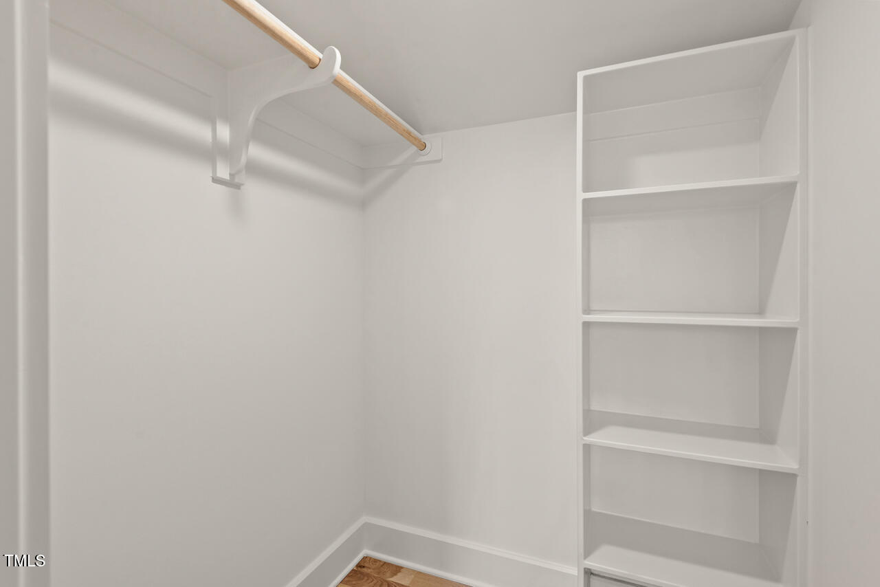 1407 Carroll Street Durham, NC 27707 - Photo 31 of 48 a view of an empty walk in closet