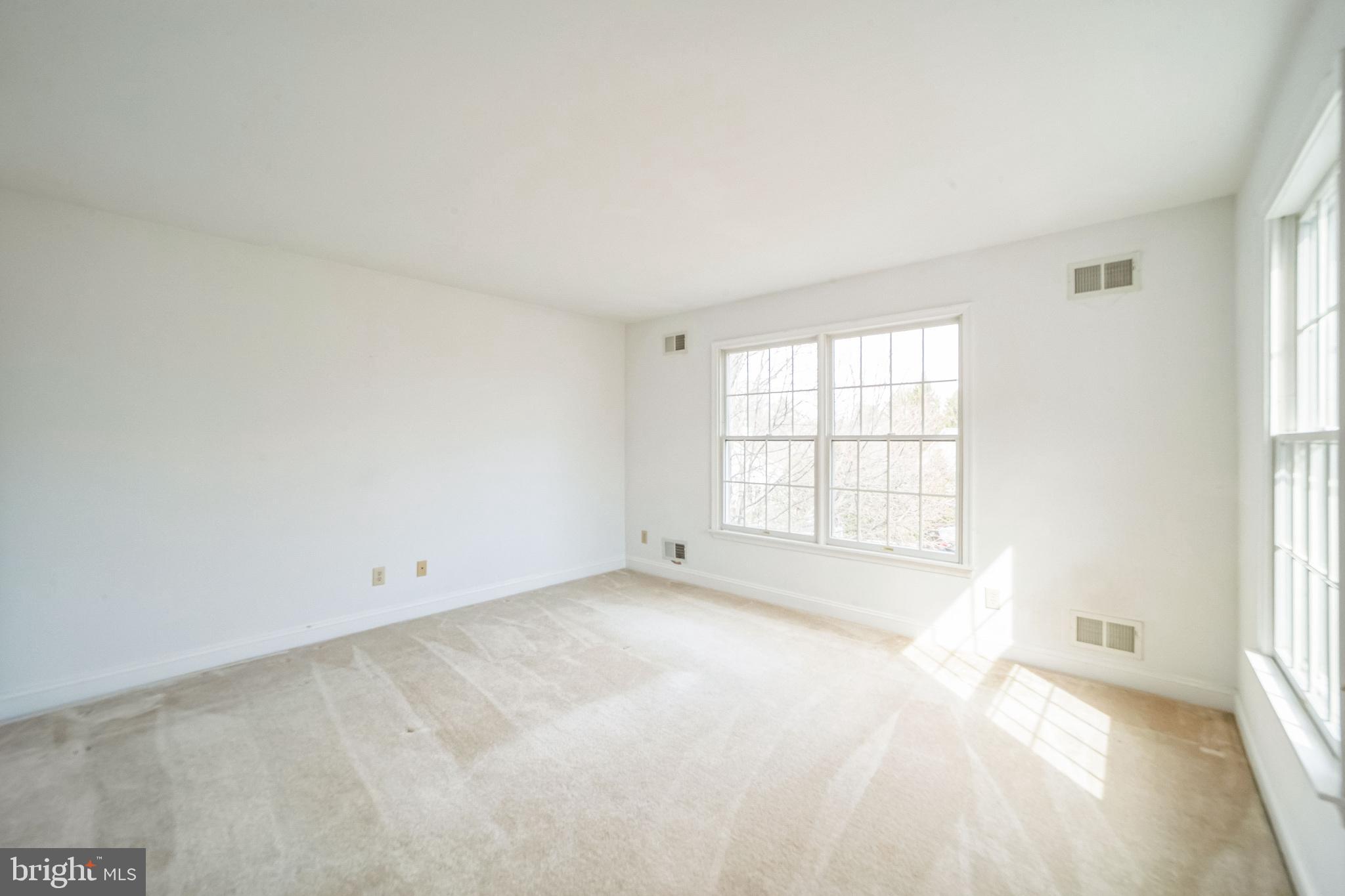 45 Hedge Row Road Princeton, NJ 08540 - Photo 18 of 24 an empty room with a window