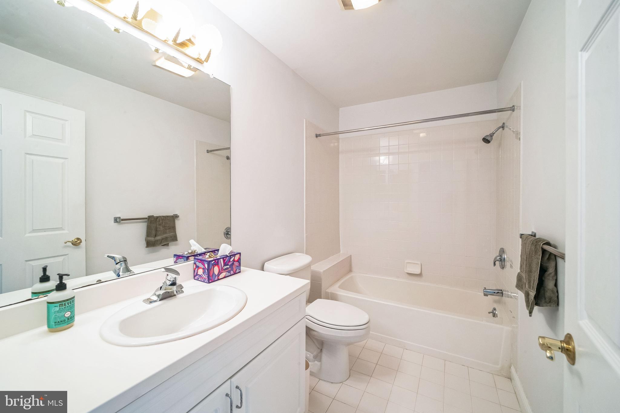 45 Hedge Row Road Princeton, NJ 08540 - Photo 20 of 24 a bathroom with a sink toilet tub and shower