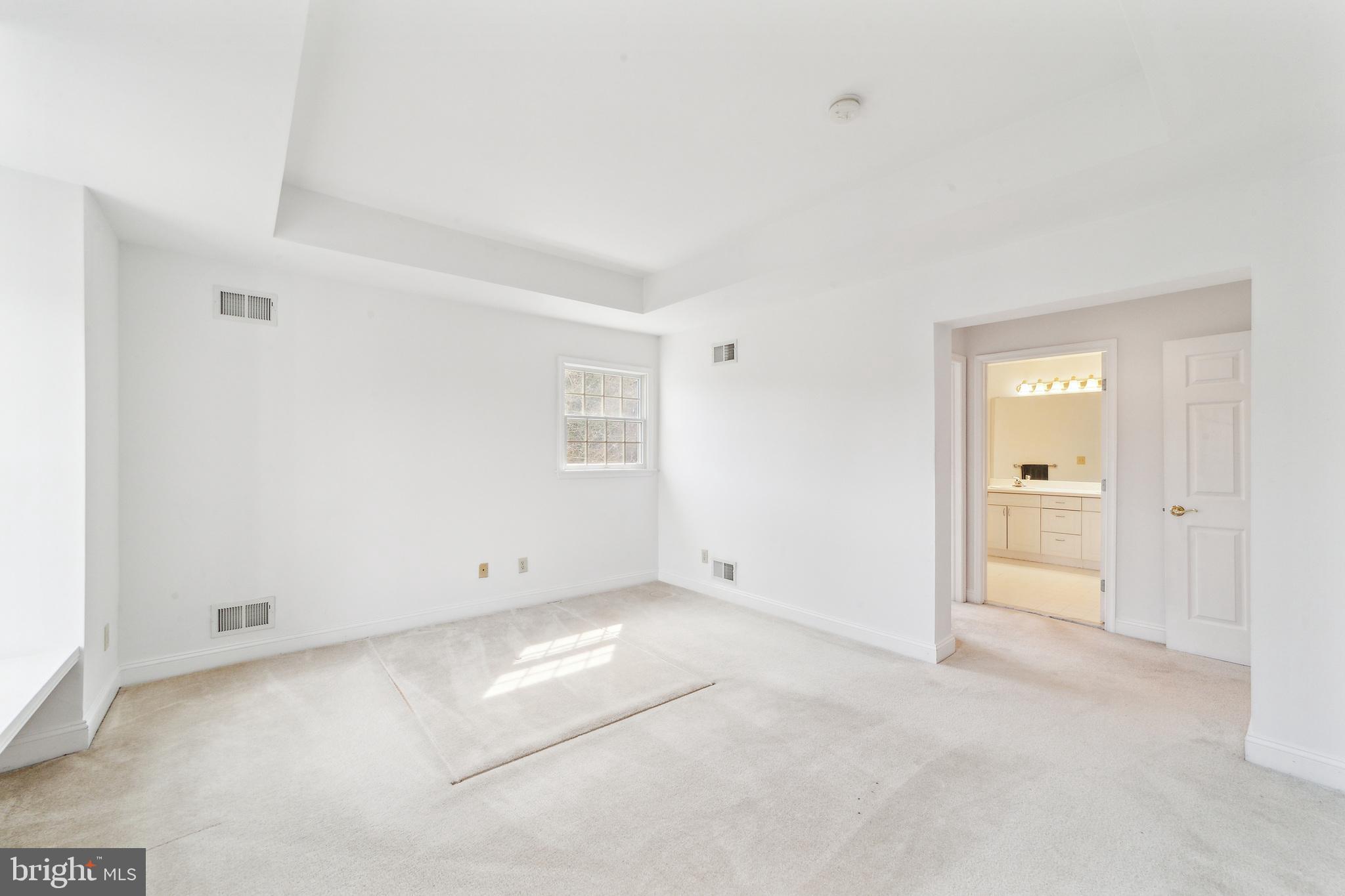 45 Hedge Row Road Princeton, NJ 08540 - Photo 9 of 24 an empty room with windows and closet