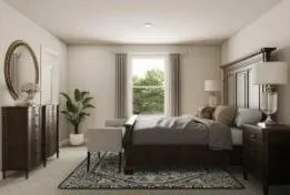 a bed room with a bed and a chair