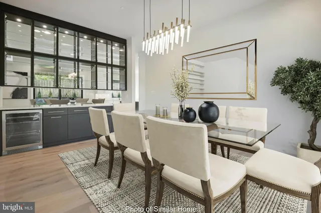 a dining room with a table chairs and a dining table