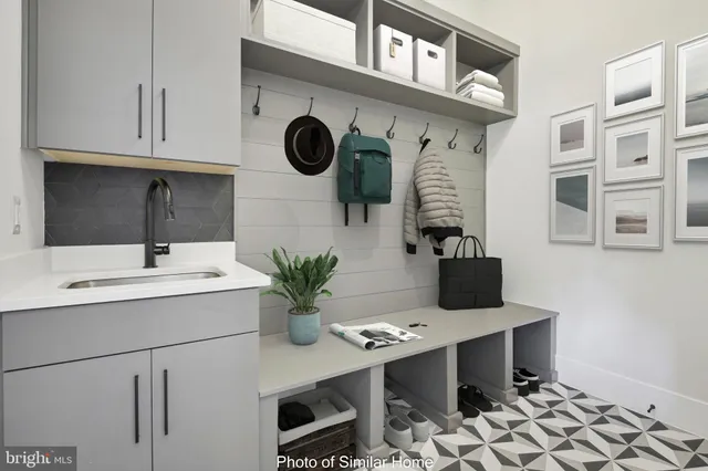 a view of a workspace with furniture