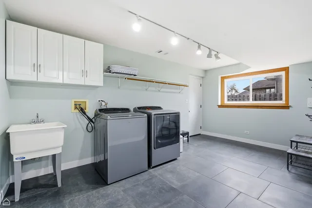 a house view with a sitting space and garden space