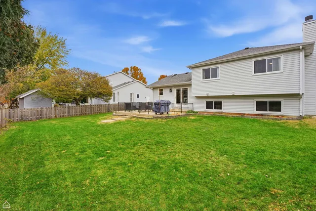 a picture of a room with a white wall and door