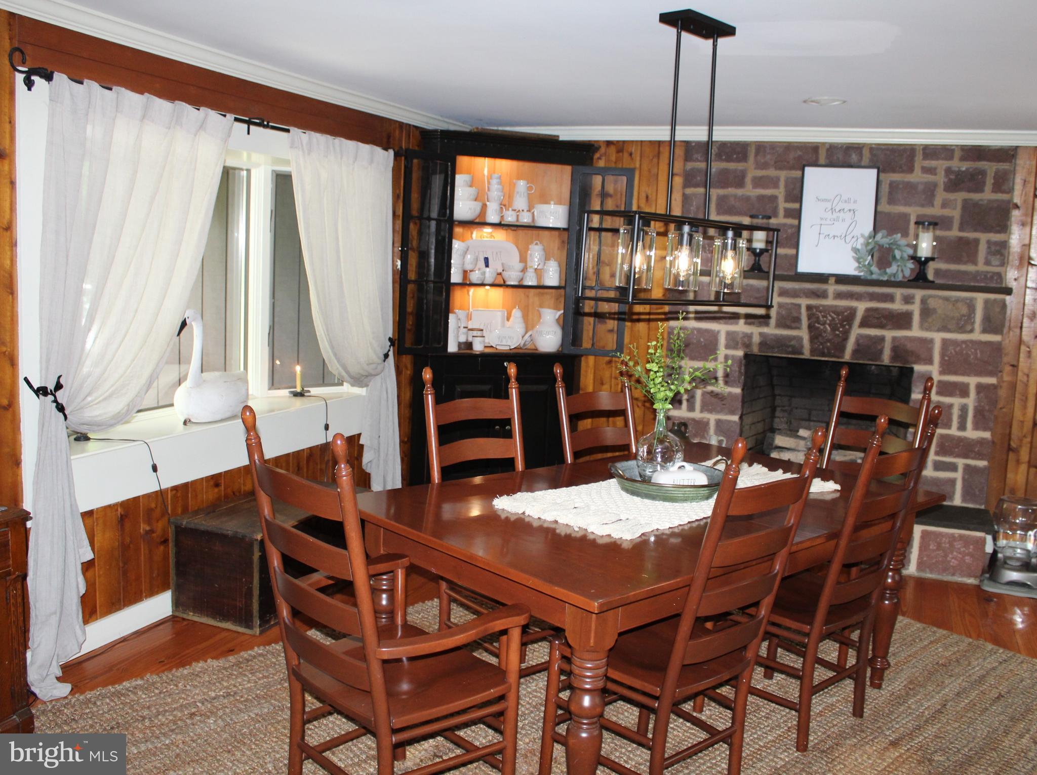 246 Acorn Lane Lititz, PA 17543 - Photo 59 of 120 a view of a dining room with furniture window and outside view