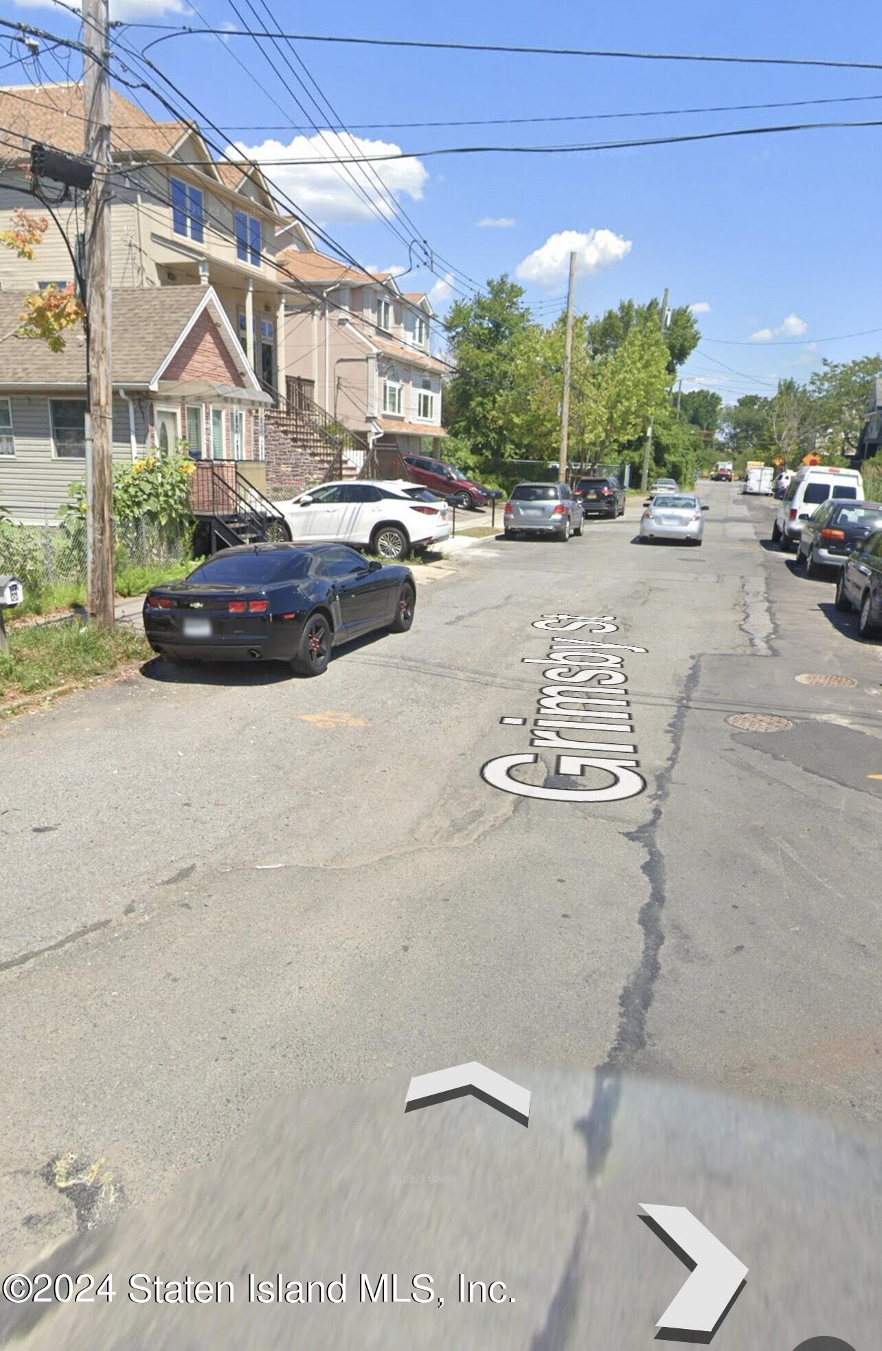 3 Mapleton Avenue Staten Island, NY 10306 - Photo 3 of 3 a car parked on the side of the road