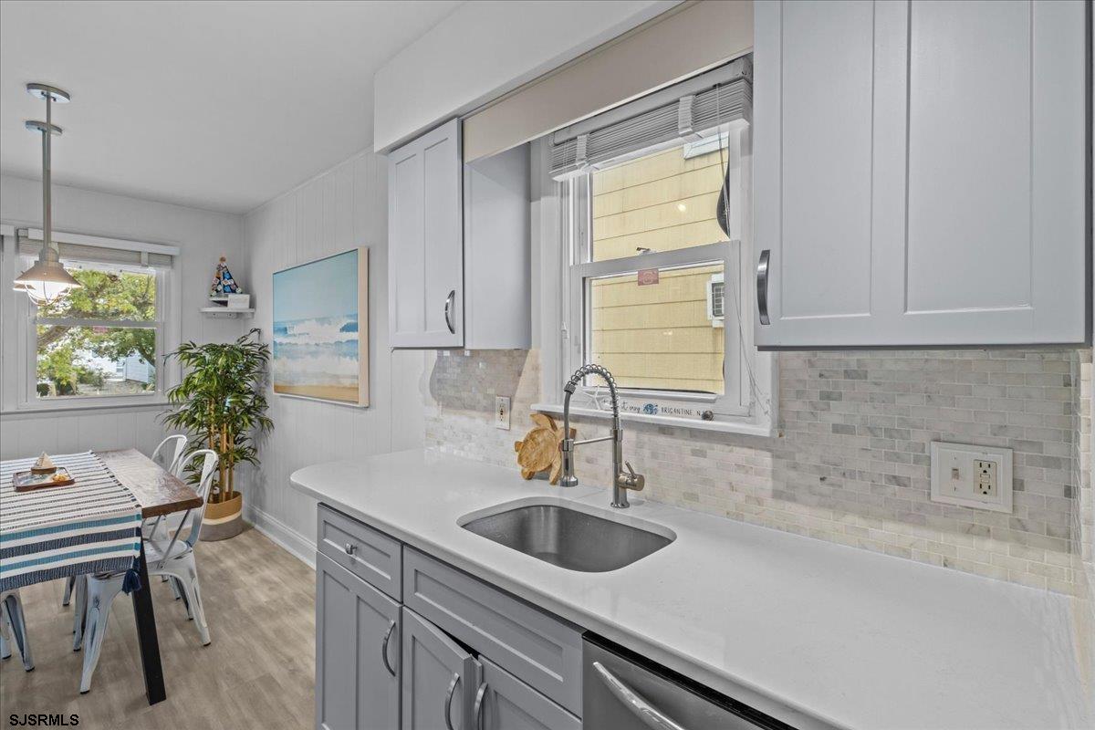 331 41st Street South, Unit 1 Brigantine, NJ 08203 - Photo 14 of 42 a kitchen with a sink and a window