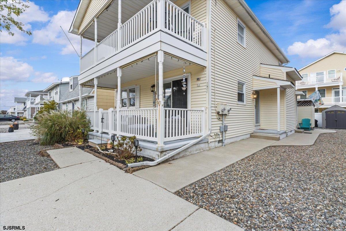331 41st Street South, Unit 1 Brigantine, NJ 08203 - Photo 2 of 42 a front view of a house with a yard