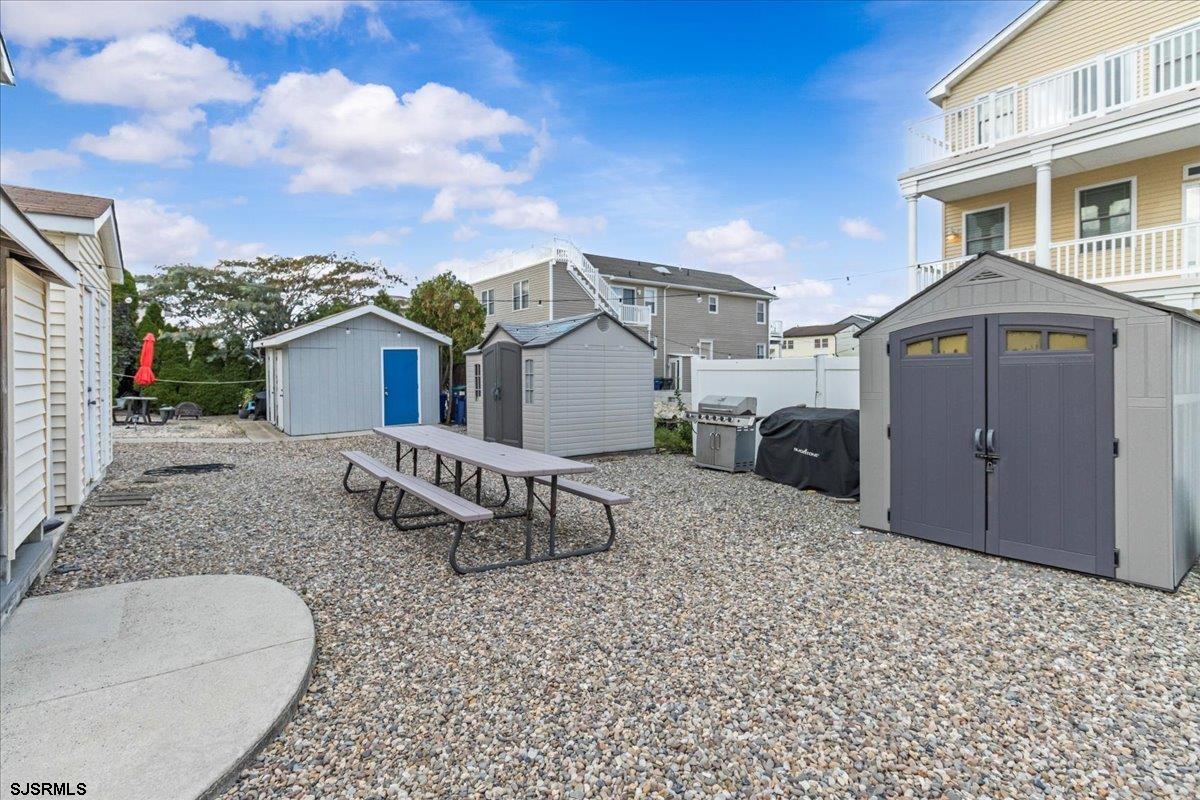 331 41st Street South, Unit 1 Brigantine, NJ 08203 - Photo 26 of 42 a view of a house with a patio